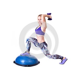 Sport woman exercise with a pilates ball and dumbbells