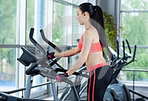 Sport woman exercising gym, fitness center