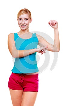 Sport woman fitness girl showing her muscles. Power and energy. Isolated.