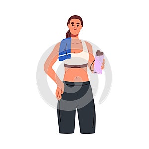 Sport woman holding water bottle in hand. Young girl in sportswear portrait, standing with drink tumbler, towel on