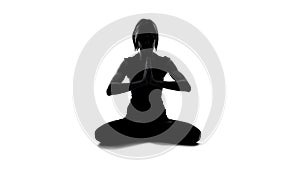 Sport woman making namaste gesture and meditating in lotus pose, yoga balance