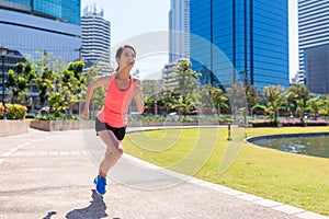 Sport Woman running in benjakitti park in Bangkok photo