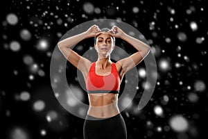 Sport. Woman sport body strong and beautiful Winter concept with