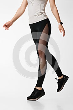 Sport woman in sportswear training and doing fitness aerobics