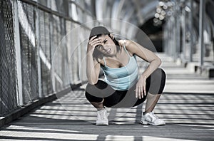Sport woman tired and exhausted breathing and cooling down after running