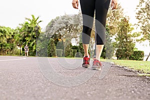 Sport woman walking towards on the road side. Step concept