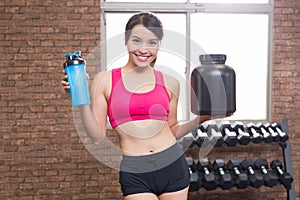 Sport woman with whey protein