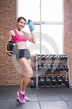 Sport woman with whey protein