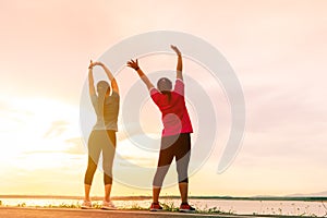 Sport women are stretching muscle before workout