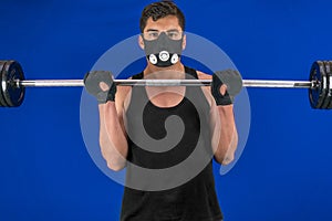 Sport, Young Athletic man exercising. Muscular and strong guy exercising