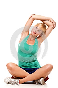 Sport Young woman doing exercise isolated on white