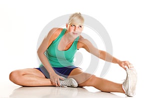 Sport Young woman doing exercise isolated on white