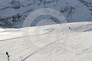 Sportgastein ski resort in the Austrian Alps. Skiers on the slope.