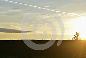 Sporting in the early evening in nature at sunset