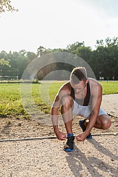 Sporting man taking rest