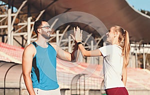 Sportish Couple Give Five Each Other