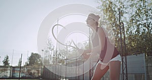 Sportiv woman playing tennis professional, at tennis court , slow motion. 4k