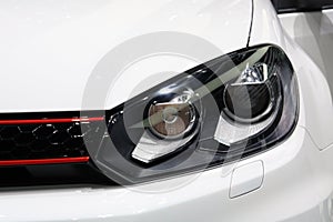 Sportive car headlight detail
