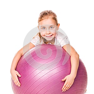 Sportive girl on a fit ball