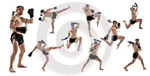 Sportive man exercising thai boxing on white background. Fighter practicing, training in martial arts in action, motion