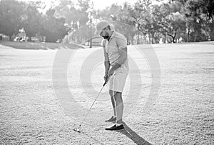 sportive man playing golf game on green grass, sport game