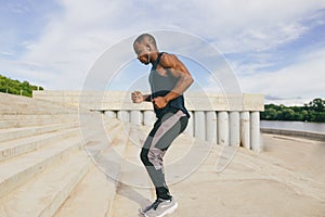 Sportive man training outdoors - Runner jogging, healthy lifestyle concept.