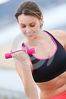 Sportive woman excercising