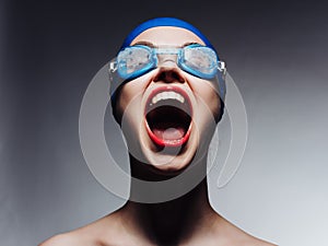 sportive woman with open mouth pool swimming Professional