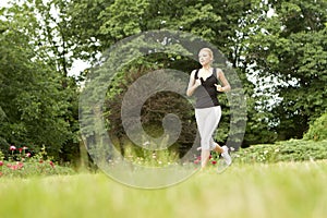 Sportive woman running photo
