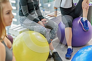 Sportive young woman in gym