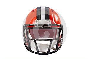 Sports and athletic training concept with front view of a red or orange american football helmet with black and grey stripe along