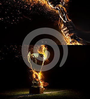 Sports background. Sport collage with fire and energy. Man`s hand holding up trophy goblet. Winner in a competition.