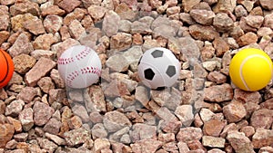 Sports balls on firm stones