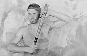 Sports and baseball training concept. Guy in grey tank top