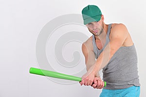 Sports and baseball training concept. Guy in grey tank top