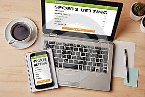 Sports betting concept on laptop and smartphone screen