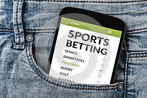 Sports betting concept on smartphone screen in jeans pocket