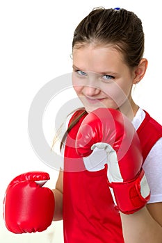 Sports boxer teenage girl, in the studio for white background.