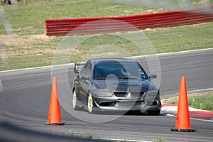 Sports Car driving on Race Course