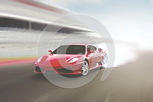 Sports car speeding on a track