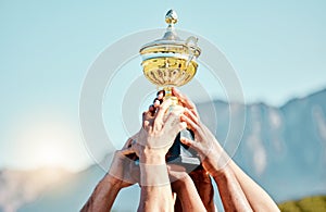 Sports, champion and hands of team with trophy for achievement, goal and success together. Celebration, winner and