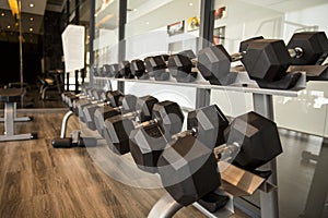 Sports dumbbells in modern sports club for a exercise in the fitness center in gym,Weight Training Equipment