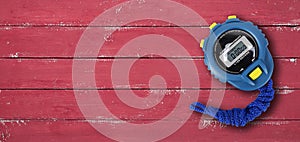 Sports equipment - Blue Stopwatch red background