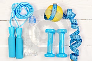 Sports equipment in cyan blue on white background