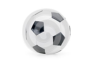 Sports equipment and leisure activity concept with a black and white generic classic leather football or soccer ball