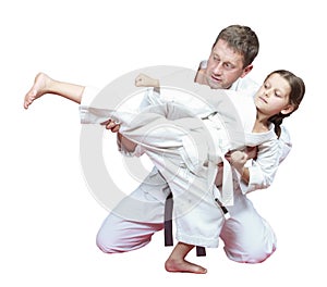 Sports family dad teaches daughter to beat kick leg