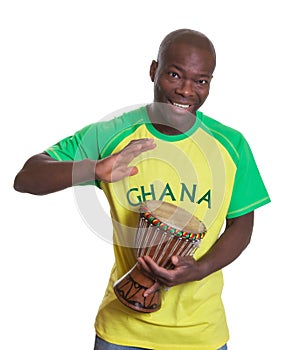 Sports fan from Ghana playing drums