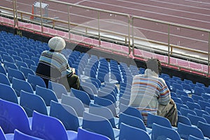 Sports fans in stadium seats