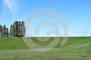 A sports field on a beautiful clear autumn day.