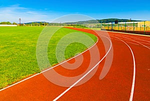 Sports field with synthetic turf and different markings